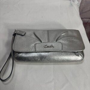 Coach Ashley leather metallic silver pleated front flat wristlet clutch purse.